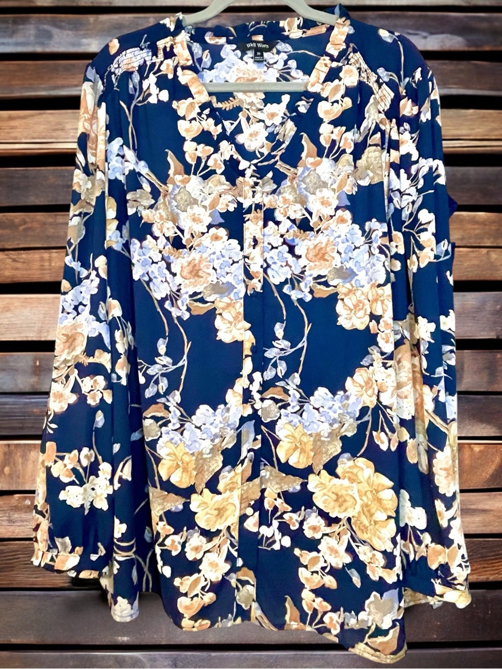 Women’s navy blue floral button up top